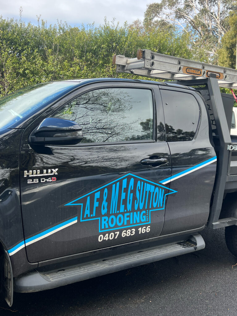 Sutton Roofing branding and logo on company vehicle